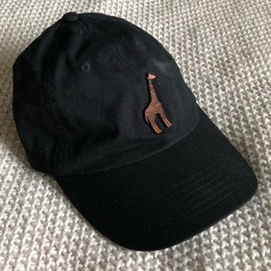 Black hat with giraffe